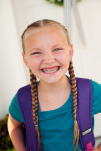 young-girl-with-braces-smiling